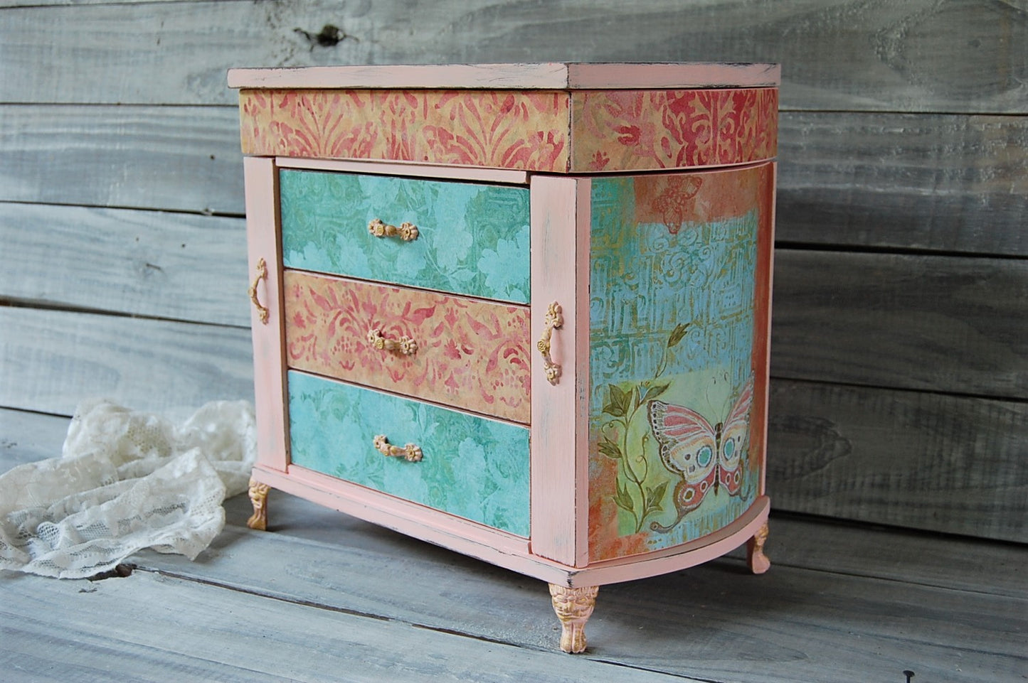 Coral & teal jewelry armoire