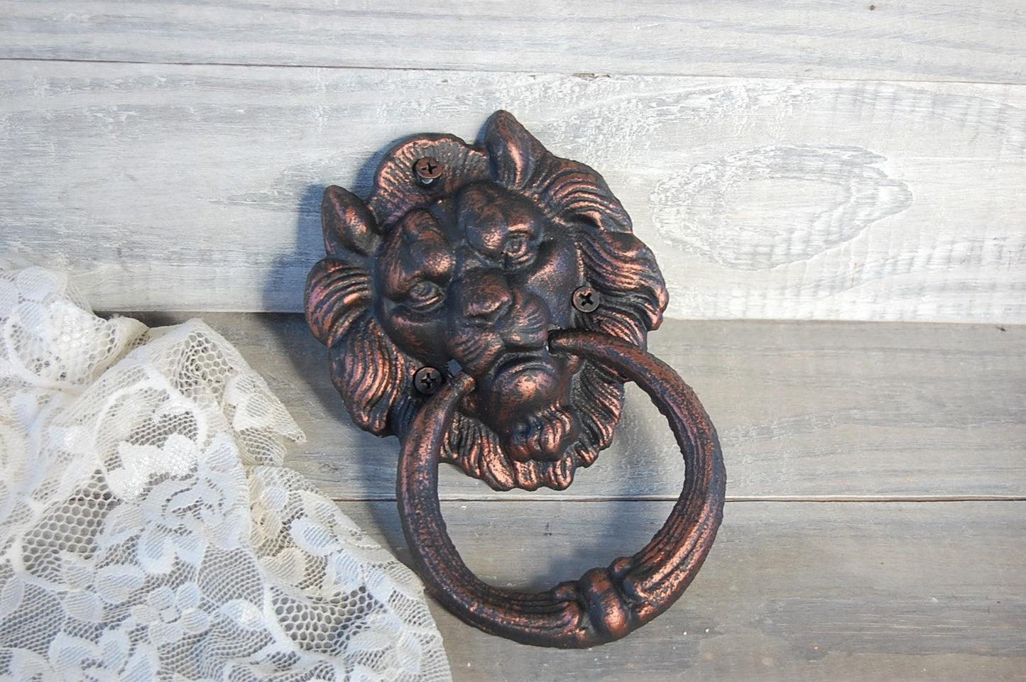 Lion's head door knocker