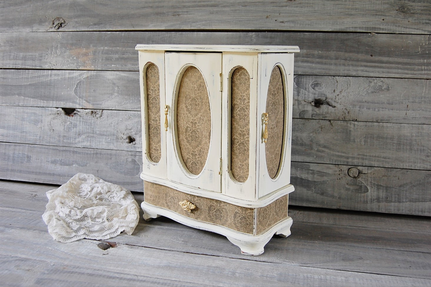 Ivory damask armoire