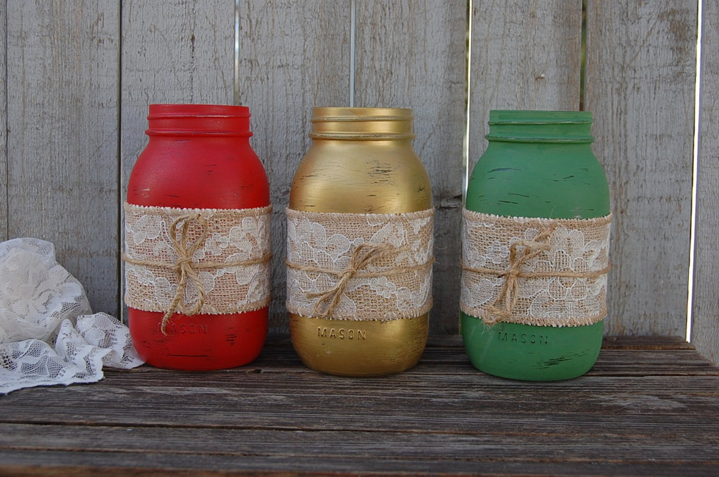 Rustic mason jars with burlap and lace