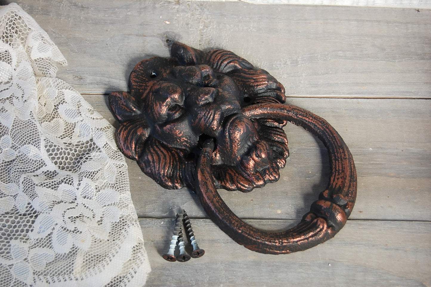 Lion's head door knocker