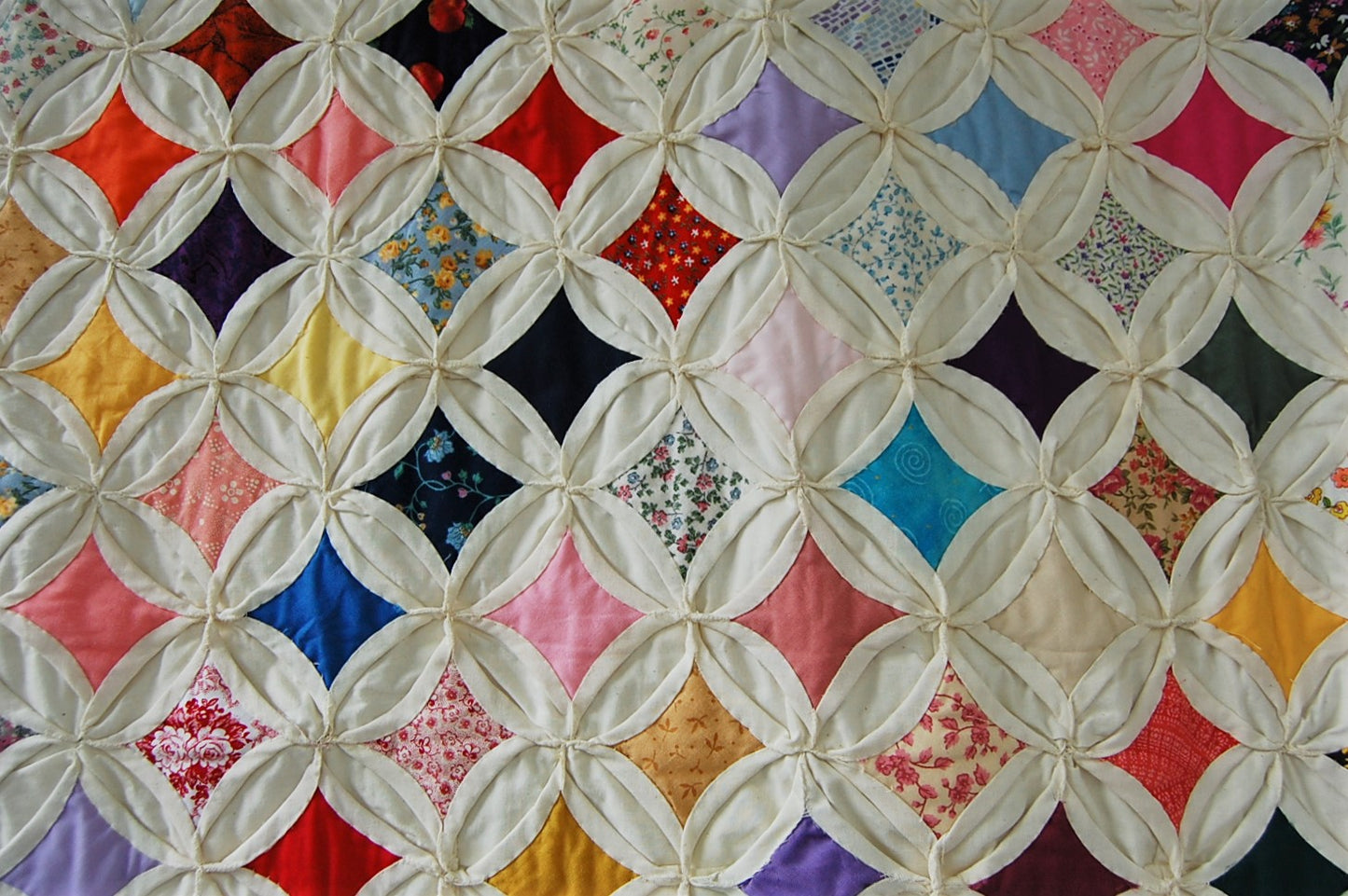 Vintage cathedral windows throw quilt