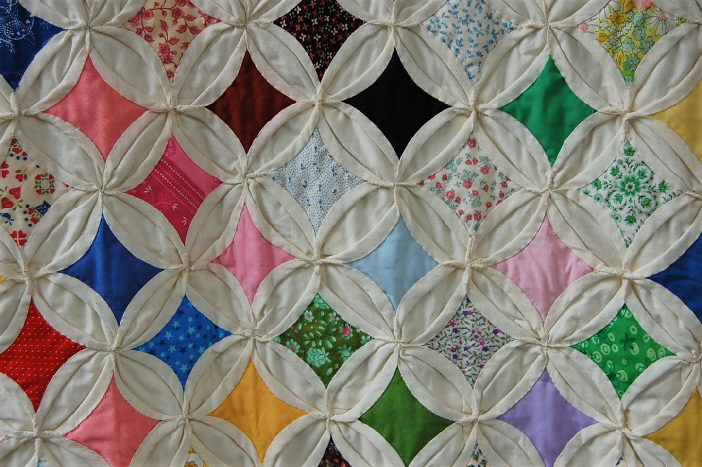 Vintage cathedral windows throw quilt