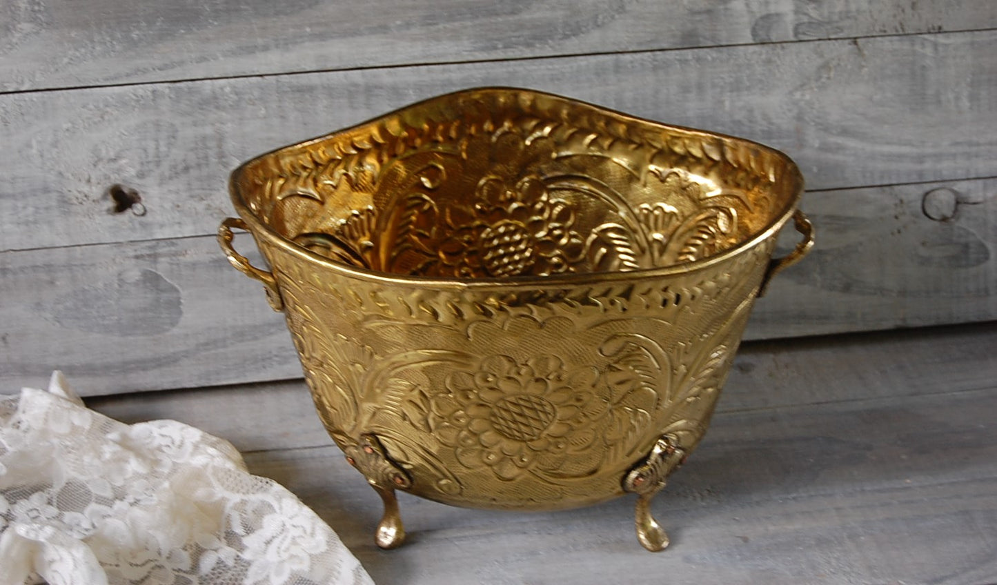 Repoussé brass bowl