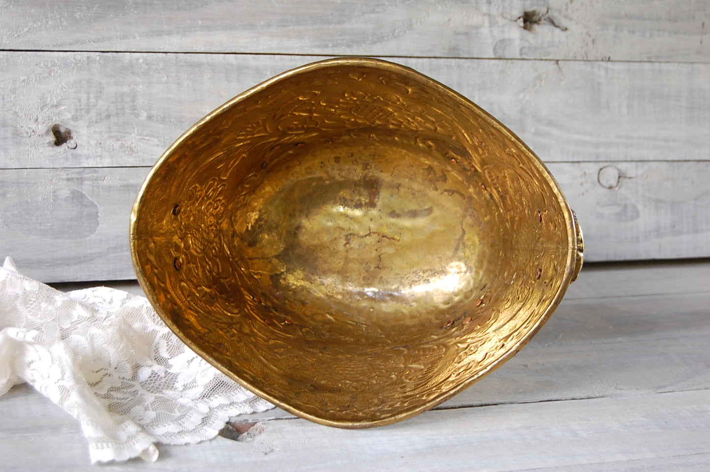 Repoussé brass bowl