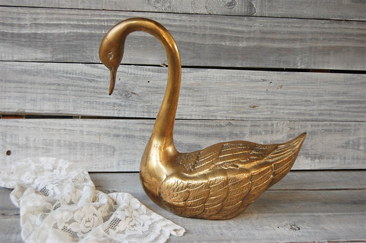 Large brass swan