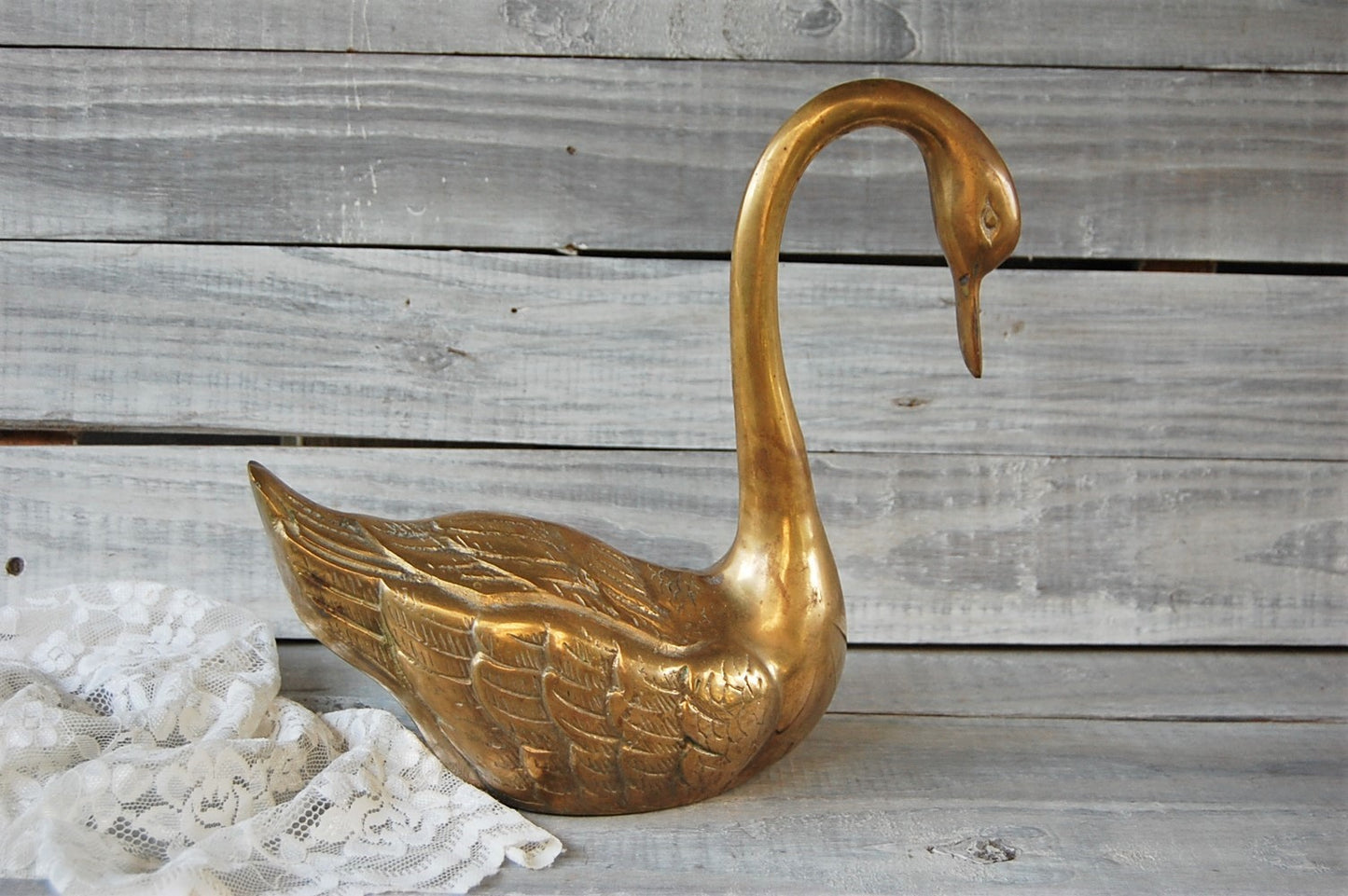 Large brass swan